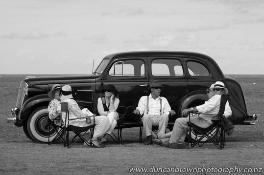 Vintage car on Marine Parade, Art Deco Weekend, Napier, in black and white photograph