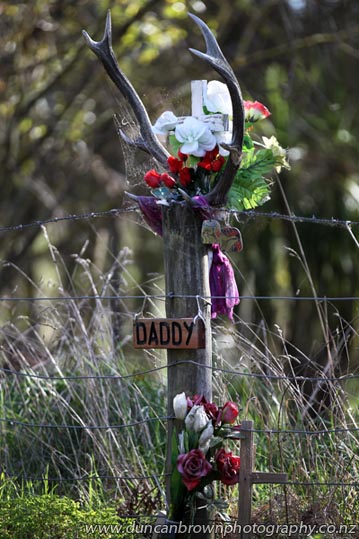 When a picture says it better than police or politicians, fatal accident roadside memorial, white cross photograph