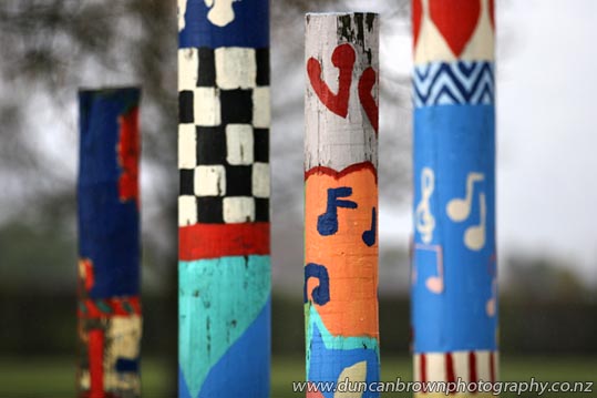 Painted poles at Heretaunga Intermediate School, Hastings photograph